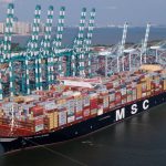msc ship leaving port filled with containers