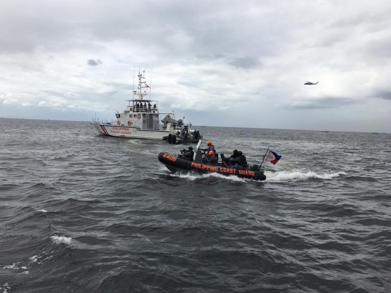 Philippine Coast Guard ships conducting drills in the waters off the port of Manila near the capital.