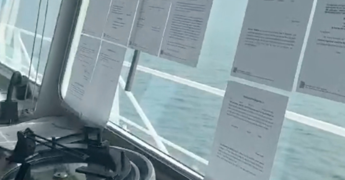 ship arrest, legal papers on windscreen in control room