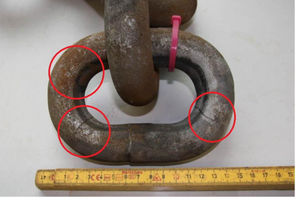 A chain link used in the lifting equipment of a fishing vessel showing fractures identified during inspection